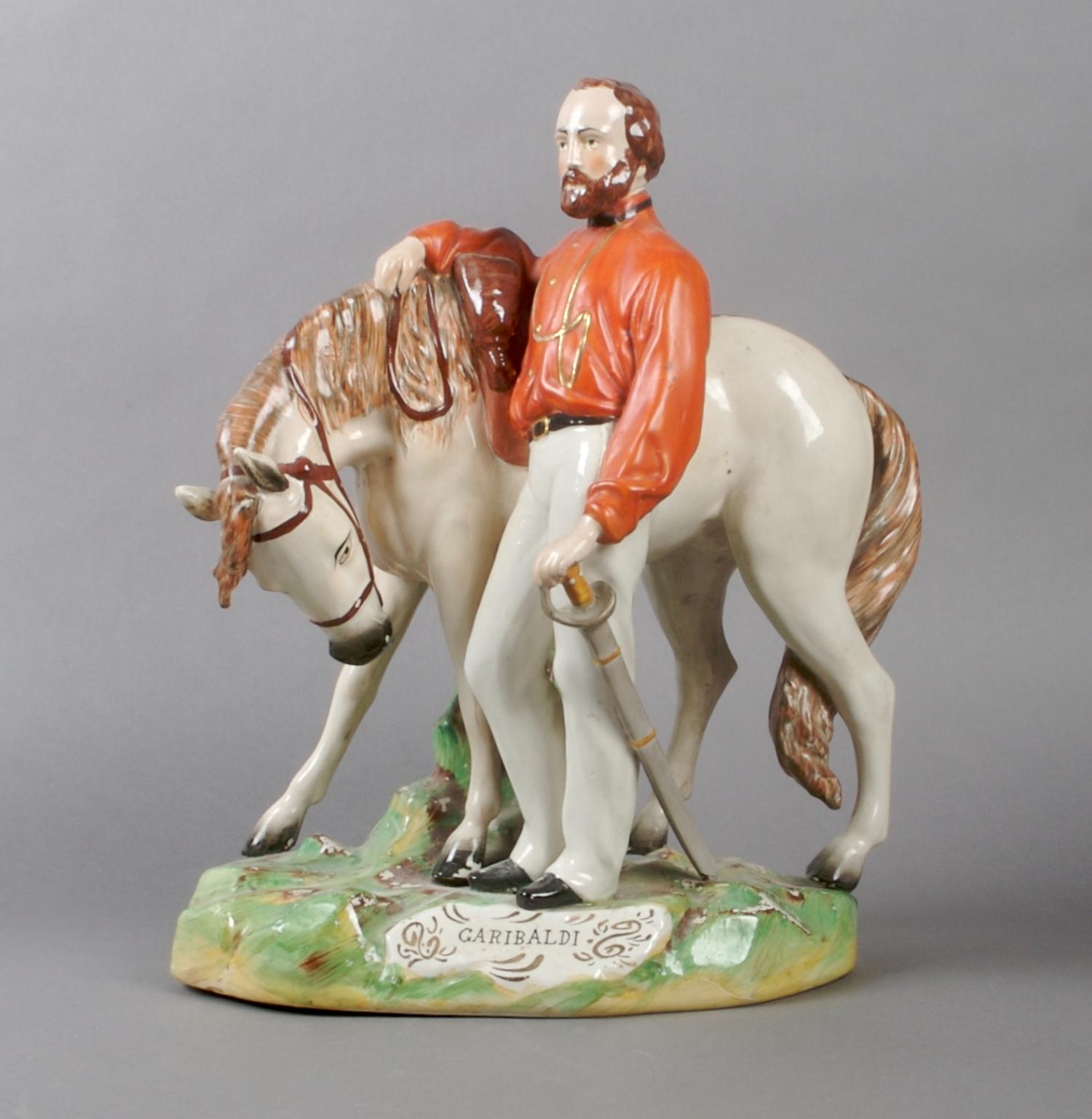 A Staffordshire Figural Group, Height 14 1/5 inches.