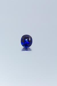 A 6.14 Carat Antique Cushion Cut Sapphire,
