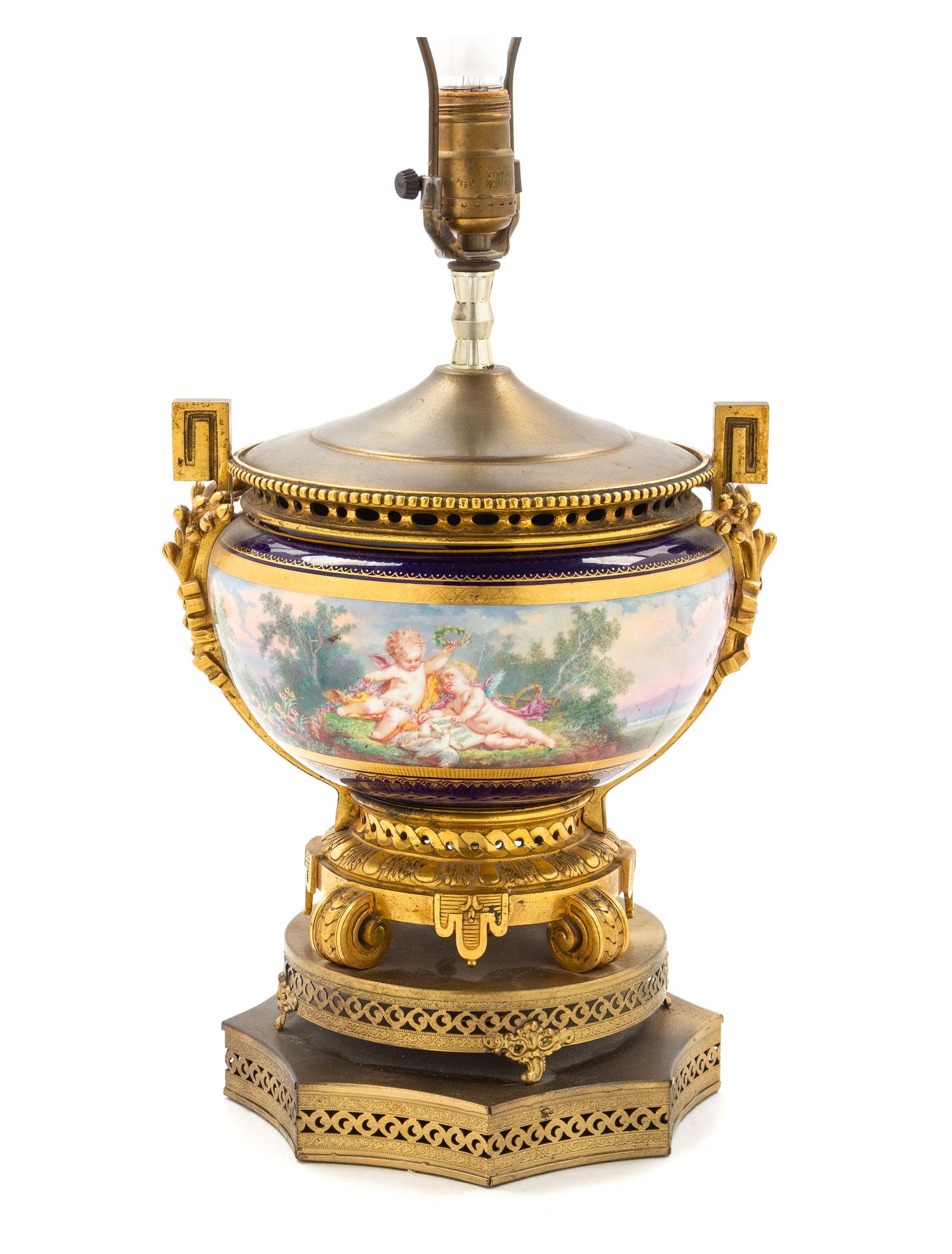 A Sevres Style Gilt Metal Mounted Porcelain Urn Height of lamp base 12 inches. — 19TH CENTURY