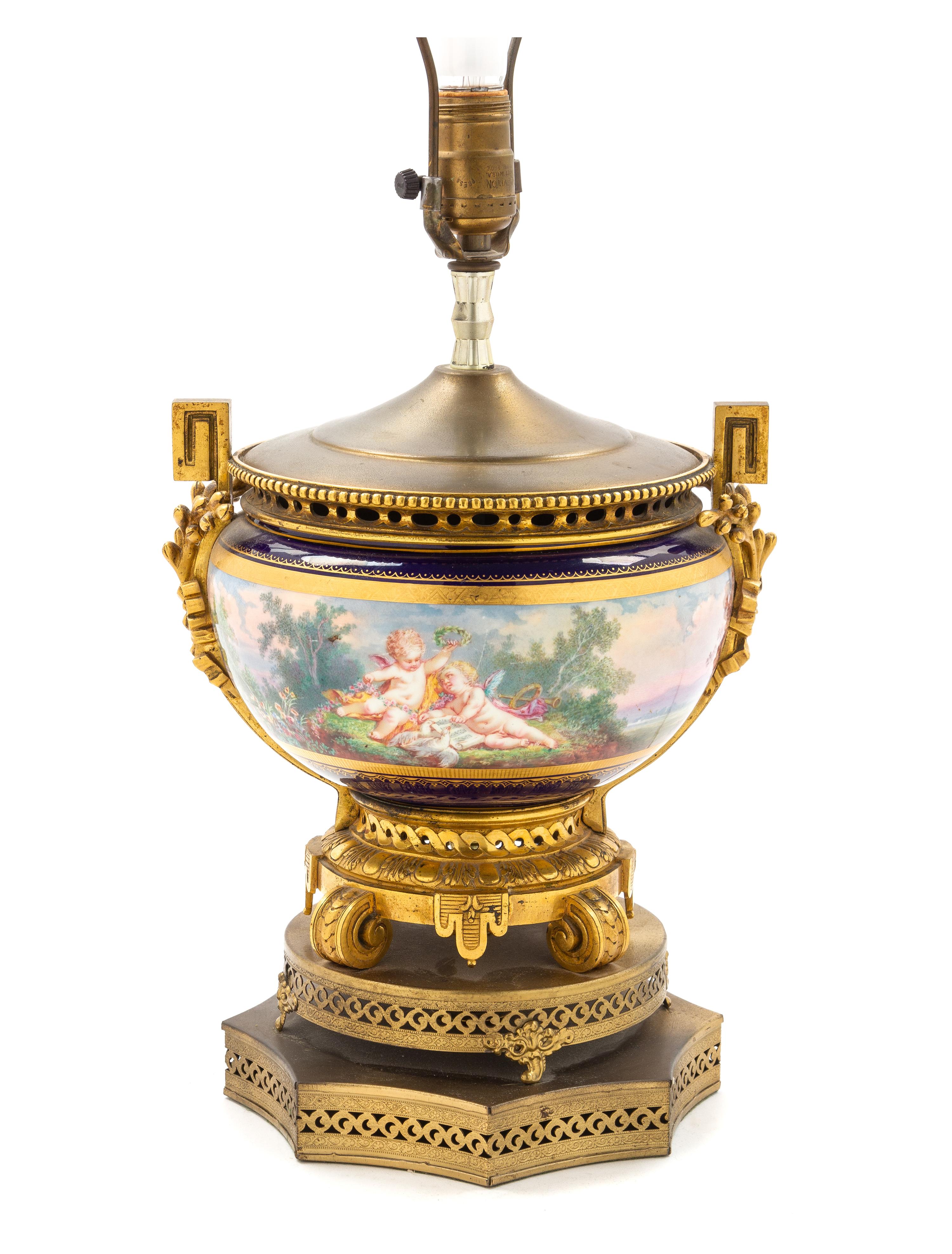 A Sevres Style Gilt Metal Mounted Porcelain Urn Height of lamp base 12 inches. — 19TH CENTURY