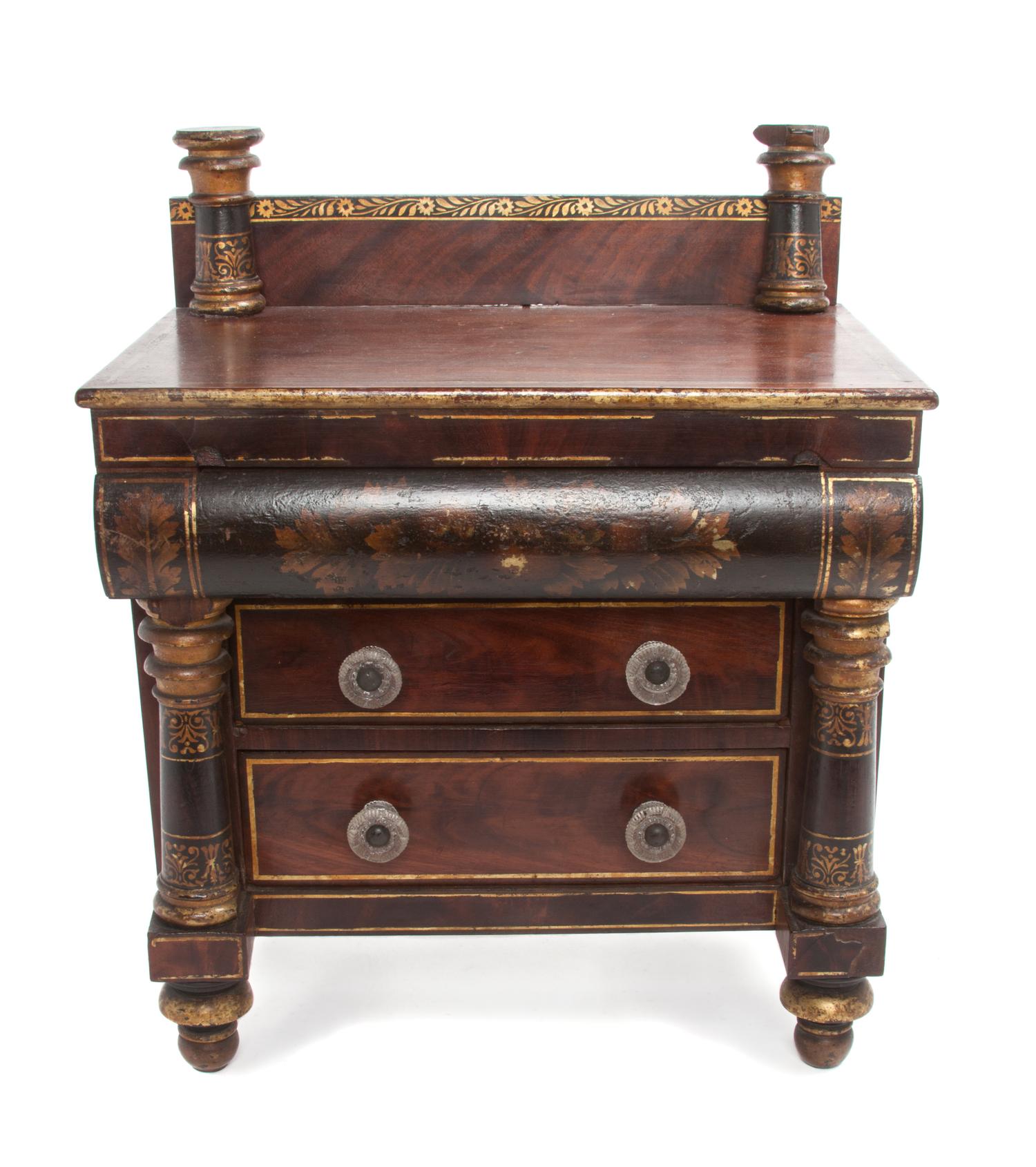 An Empire Style Miniature Chest of Drawers Height 15 1/4 x width 12 1/2 x depth 8 inches.