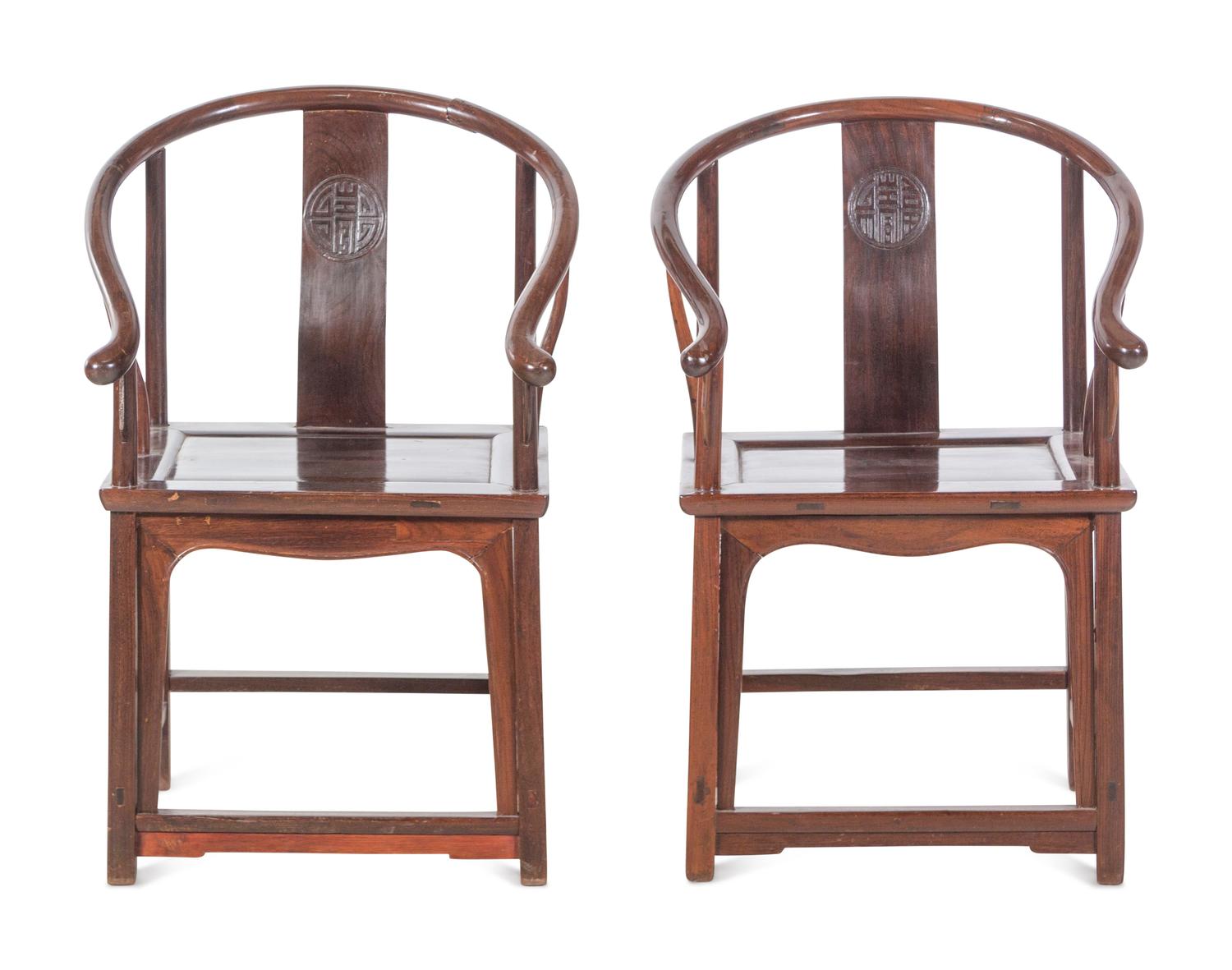 A Pair of Chinese Hardwood Hoop-Back Armchairs