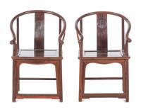 A Pair of Chinese Hardwood Hoop-Back Armchairs