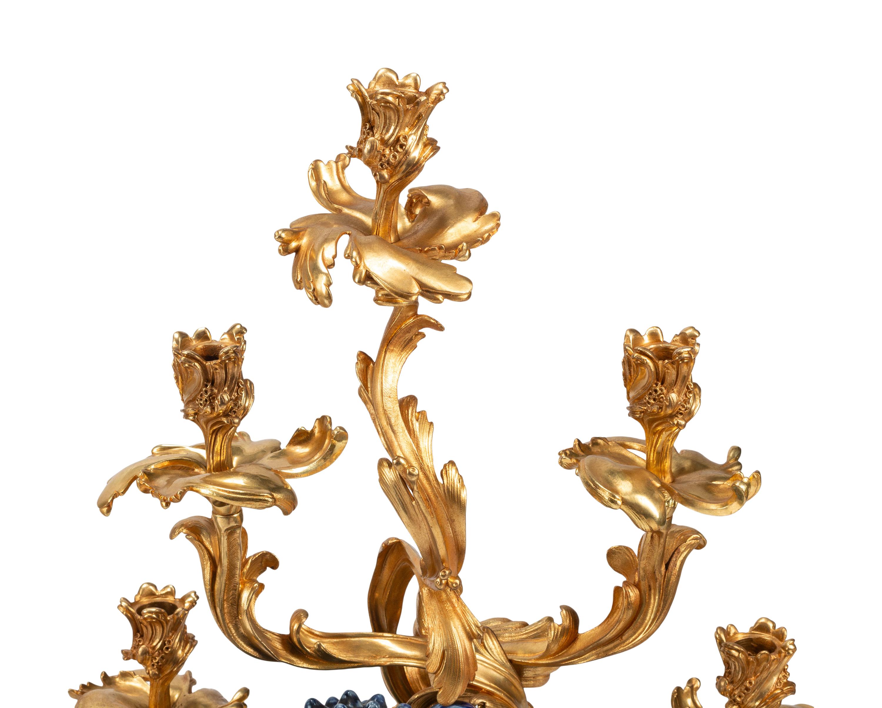 A Pair of Large Gilt Bronze Mounted Porcelain Temple Lion Candelabra