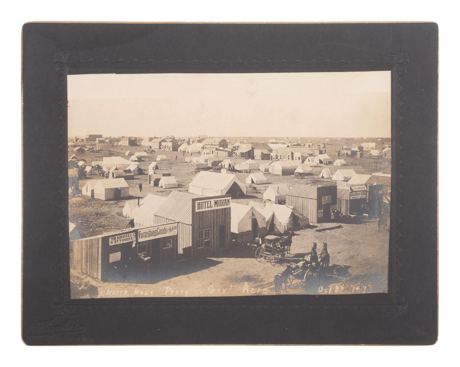 [WESTERN AMERICANA]. A group of 4 Oklahoma Land Rush photographs. Perry, Oklahoma Territory: Hughes, 28 September-3 October 1893.