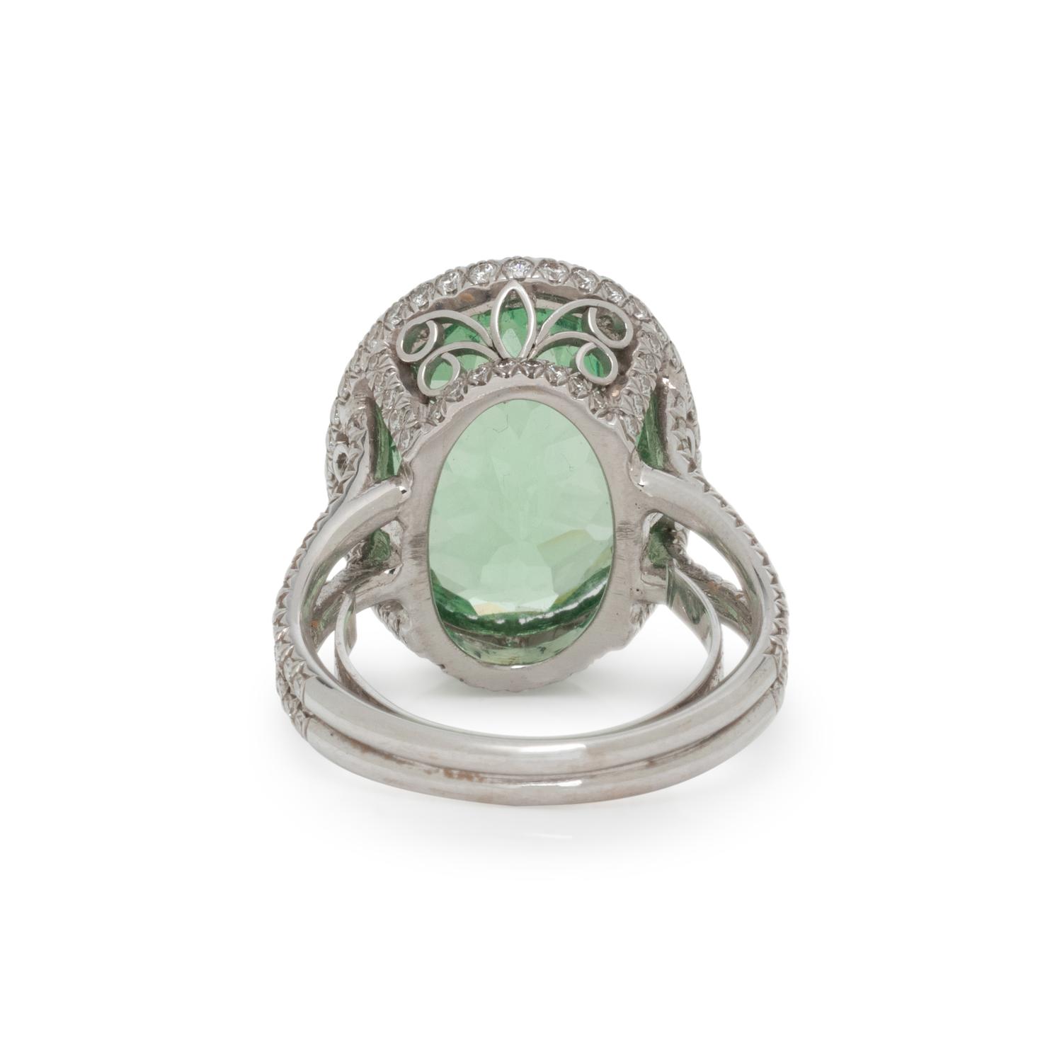 GREEN GARNET AND DIAMOND RING