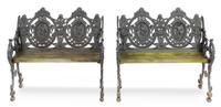 A Pair of Victorian Painted Iron Double-Back Garden Benches Height 35 x width 39 x depth 30 inches.