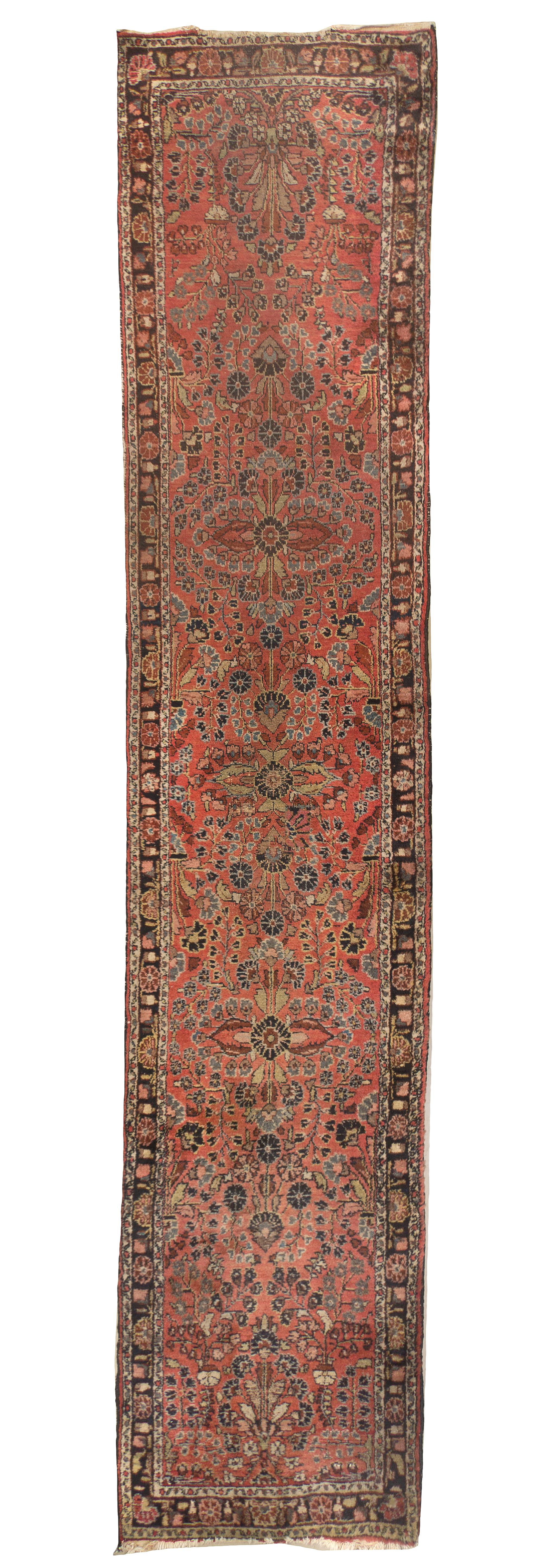 A Sarouk Wool Runner, 12 feet 4 inches x 2 feet 7 inches.