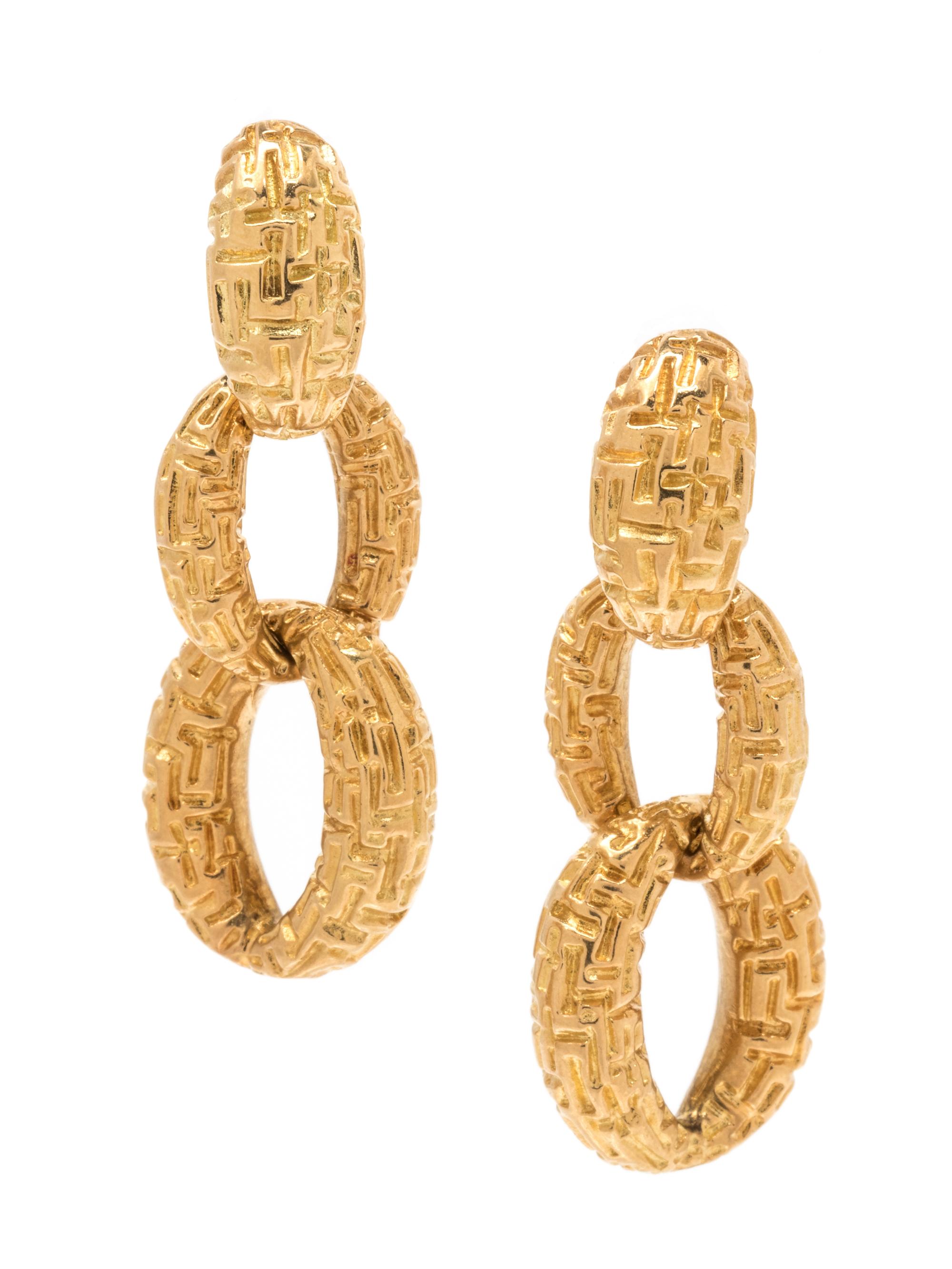 A Pair of 18 Karat Yellow Gold Earclips,