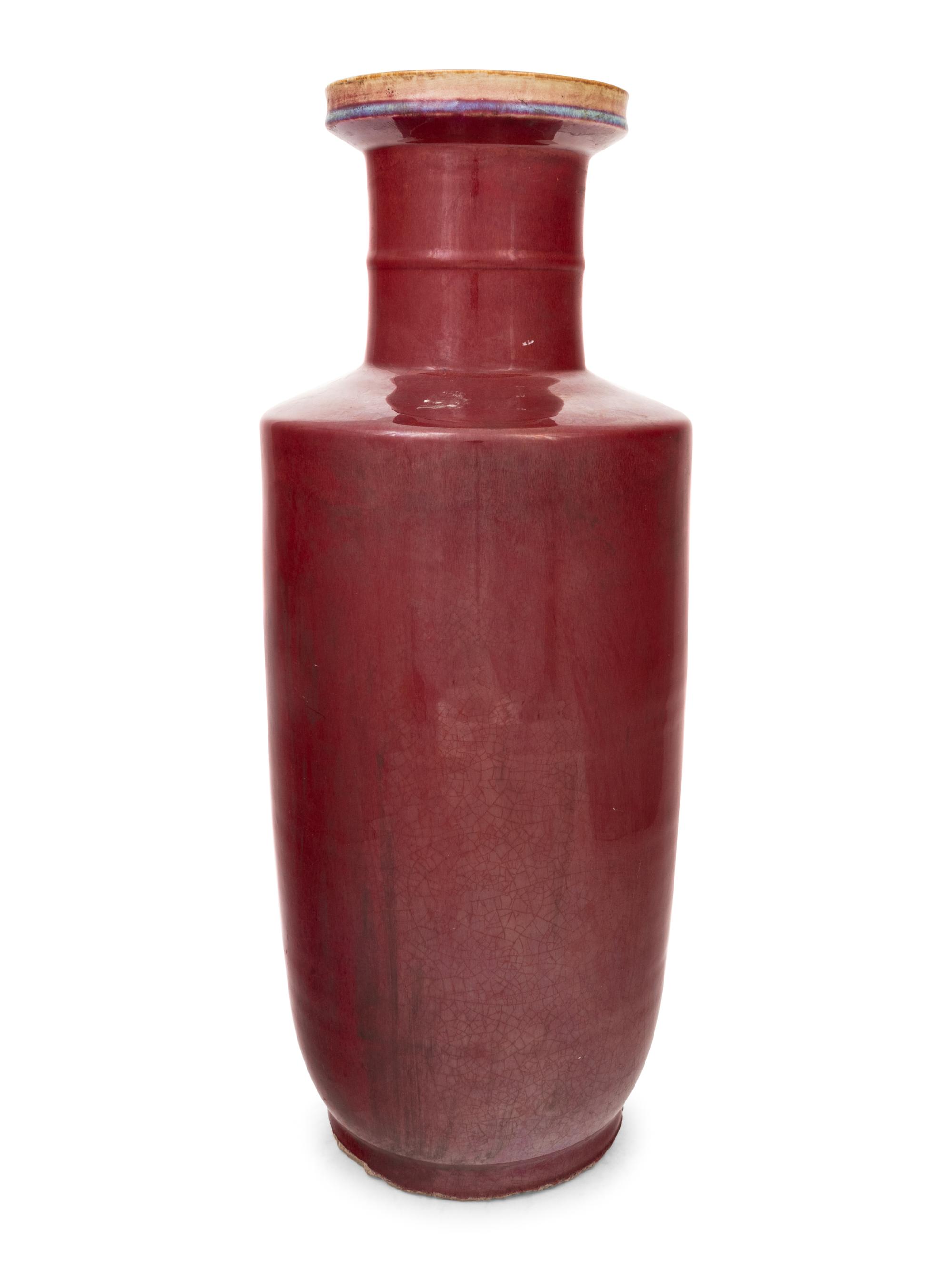 A Large Chinese Sang-de-Boeuf Glazed Porcelain Rouleau Vase
