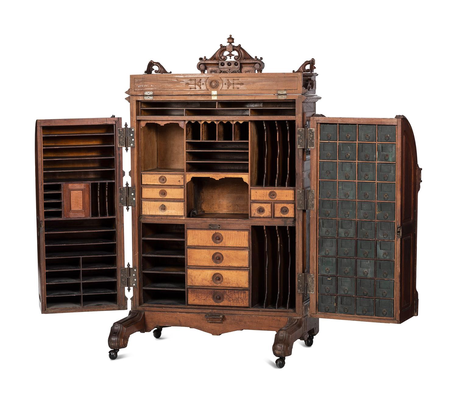 A Renaissance Revival Carved and Burl Walnut Wooton Desk