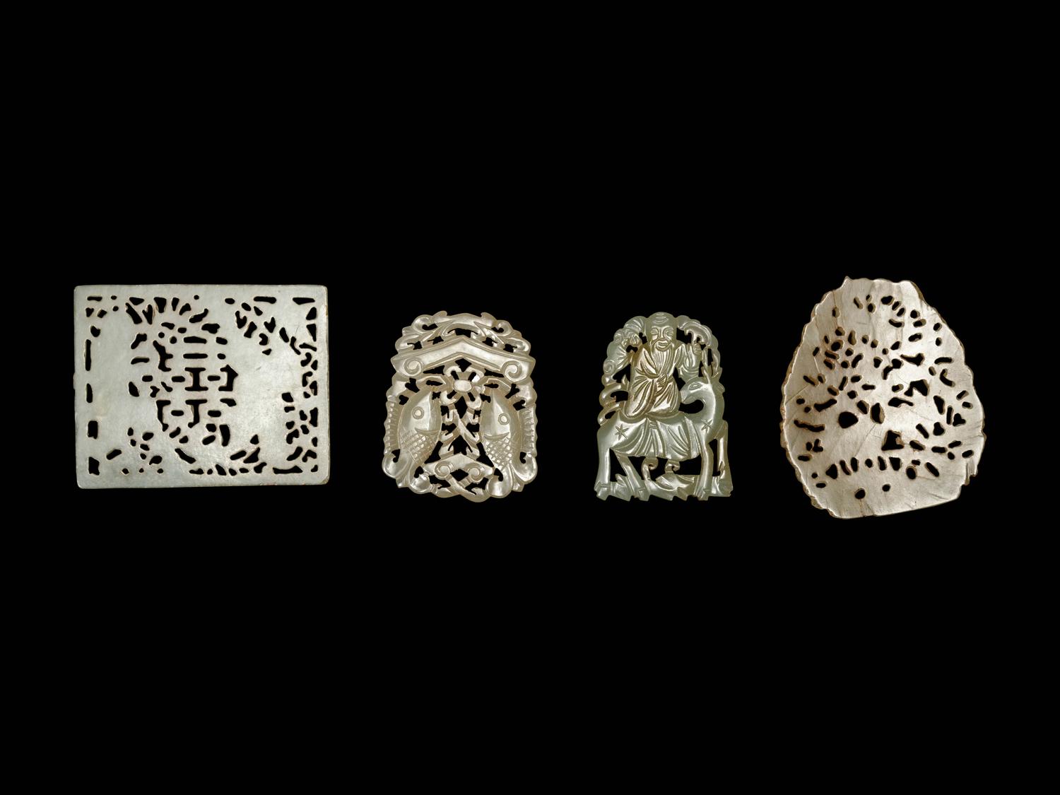 Five Chinese White and Pale Celadon Jade Plaques
