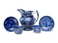A Historical Blue Staffordshire Pitcher and Two Cups with Saucers