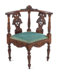 An English Carved Walnut Corner Chair