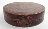 A Lacquered Circular Box and Cover. Diameter 16 inches.