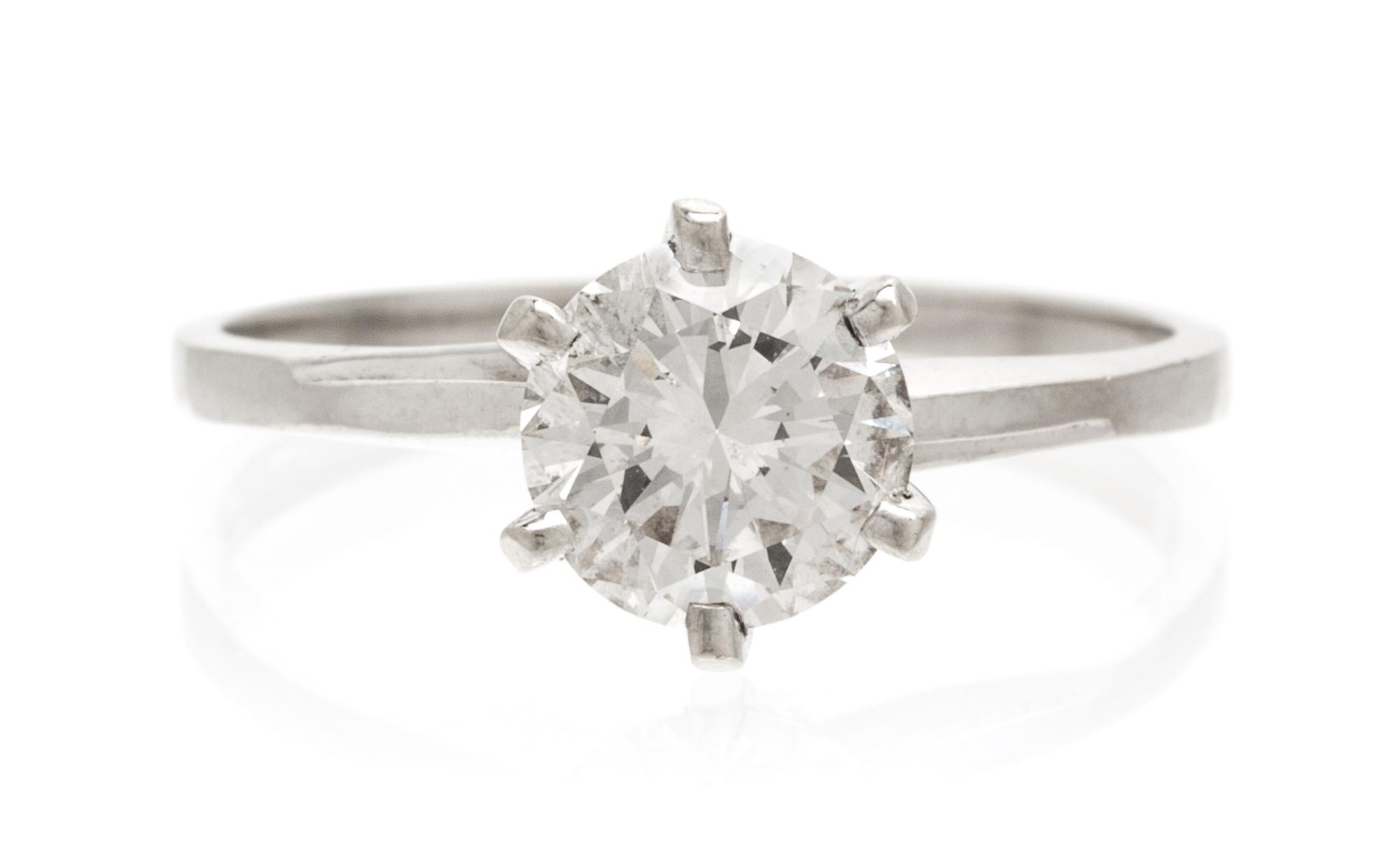 A 14 Karat White Gold and Diamond Solitaire Ring, 1.20 dwts.