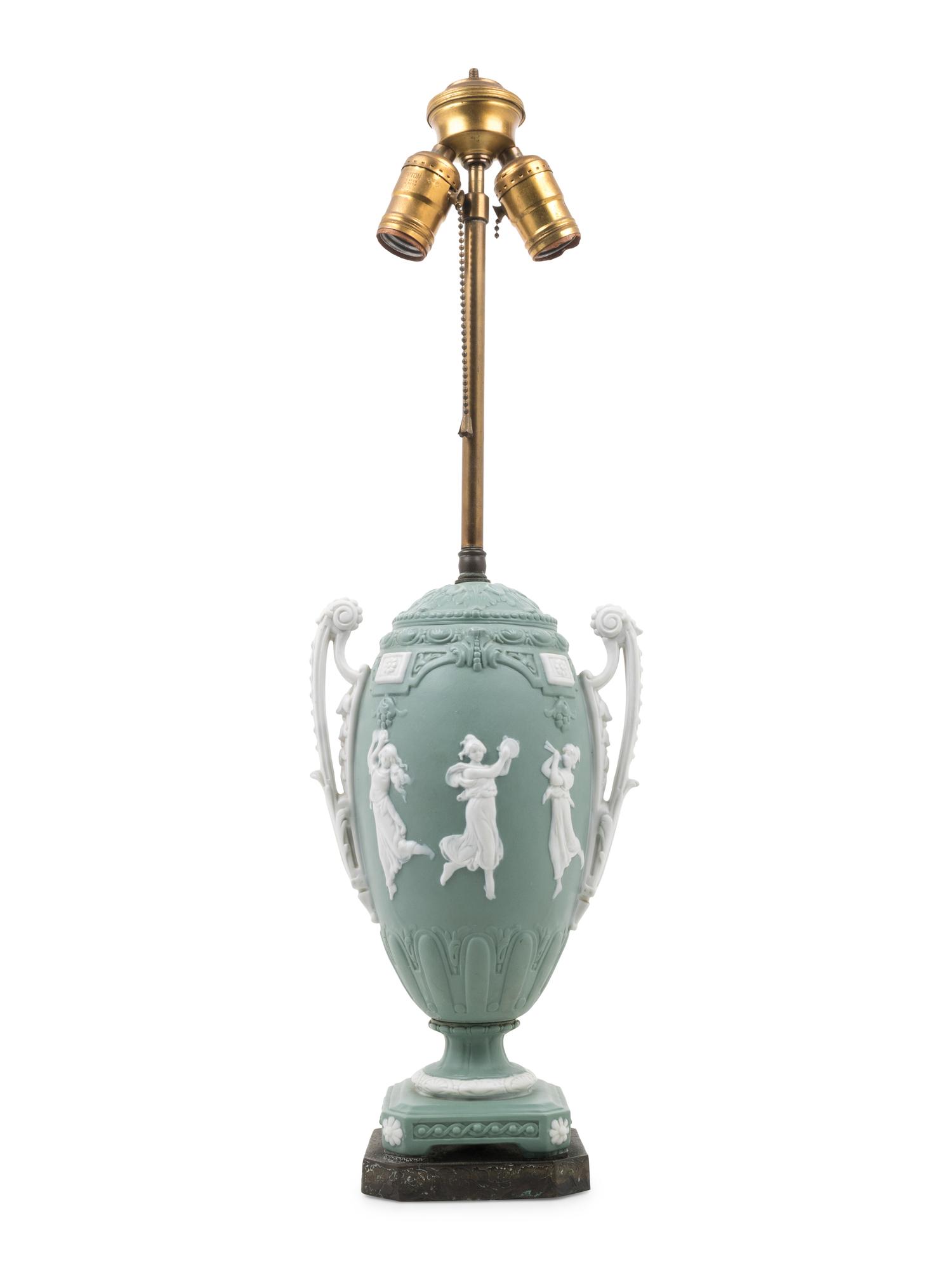 A Continental Bisque Porcelain Urn Mounted as a Lamp
