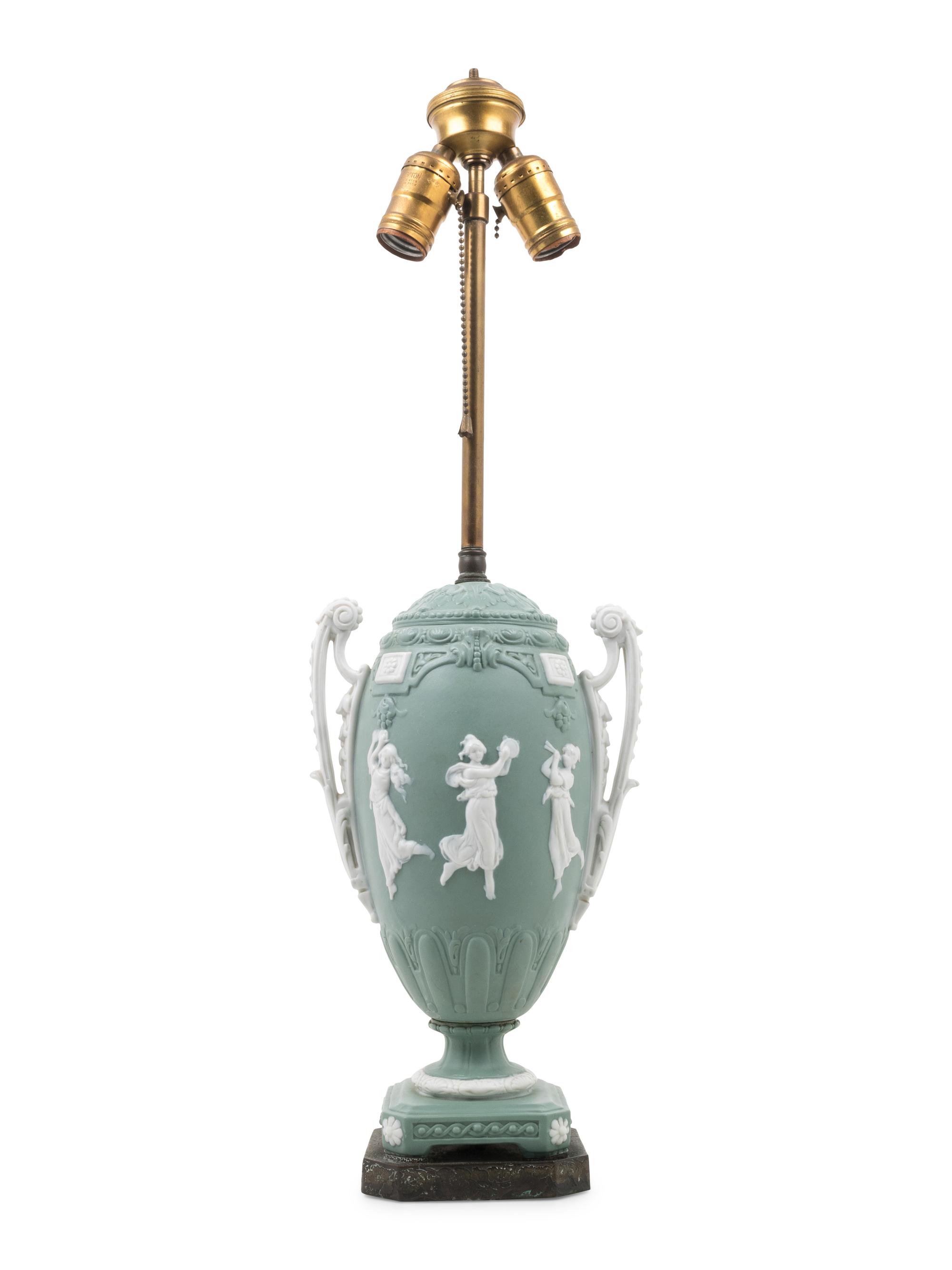 A Continental Bisque Porcelain Urn Mounted as a Lamp