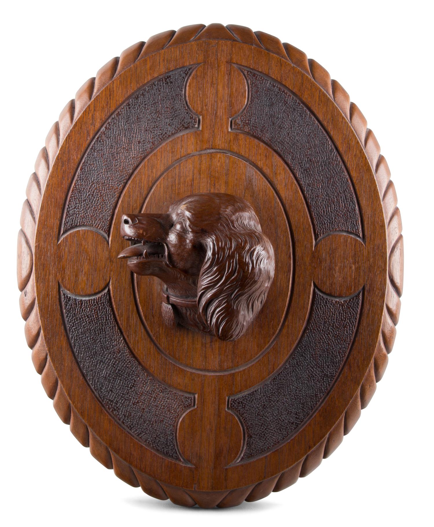 A Black Forest Carved Oak Plaque Height 19 1/2 inches. — 19THE CENTURY