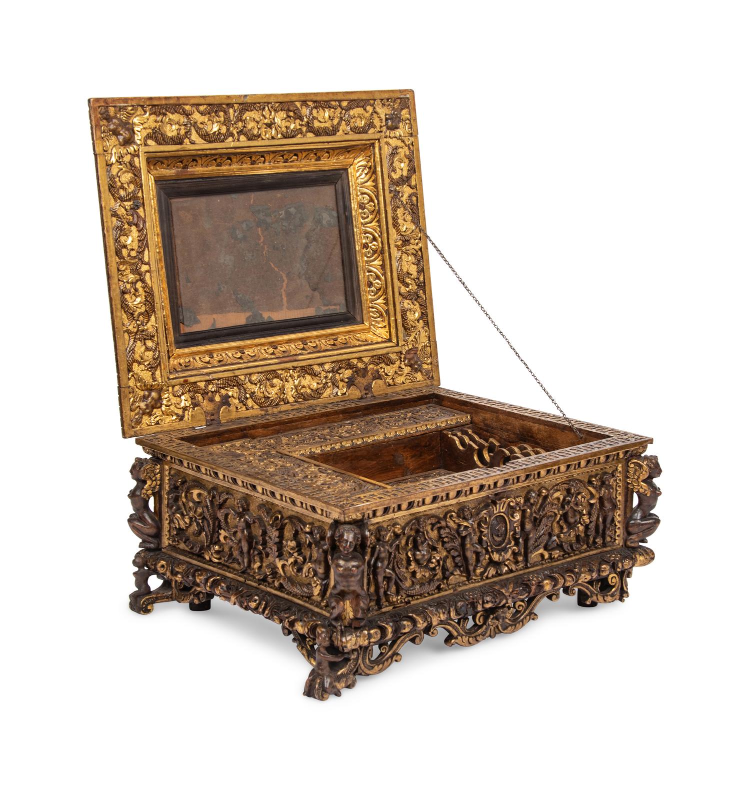 An Italian Parcel Gilt and Carved Walnut Orpheus and Eurydice Casket