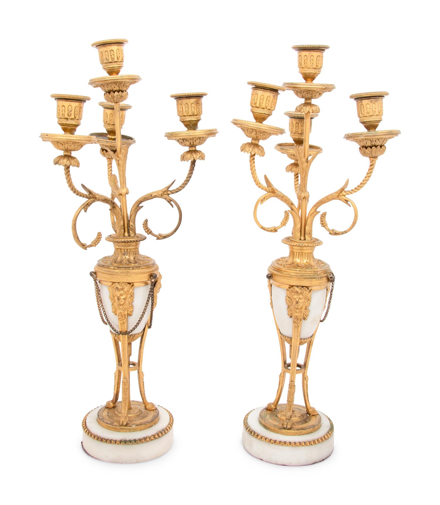 A Pair of French Gilt Bronze and Marble Four-Light Candelabra