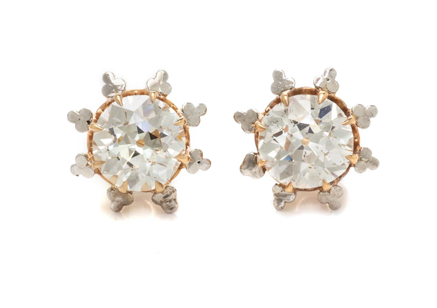A Pair of Bicolor Gold and Diamond Stud Earrings, 2.90 dwts.