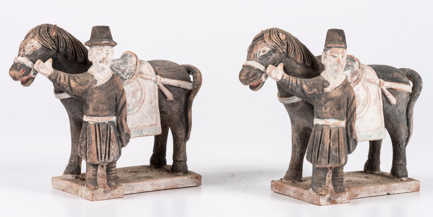 A Pair of Chinese Terracotta Horses with Standing Attendants