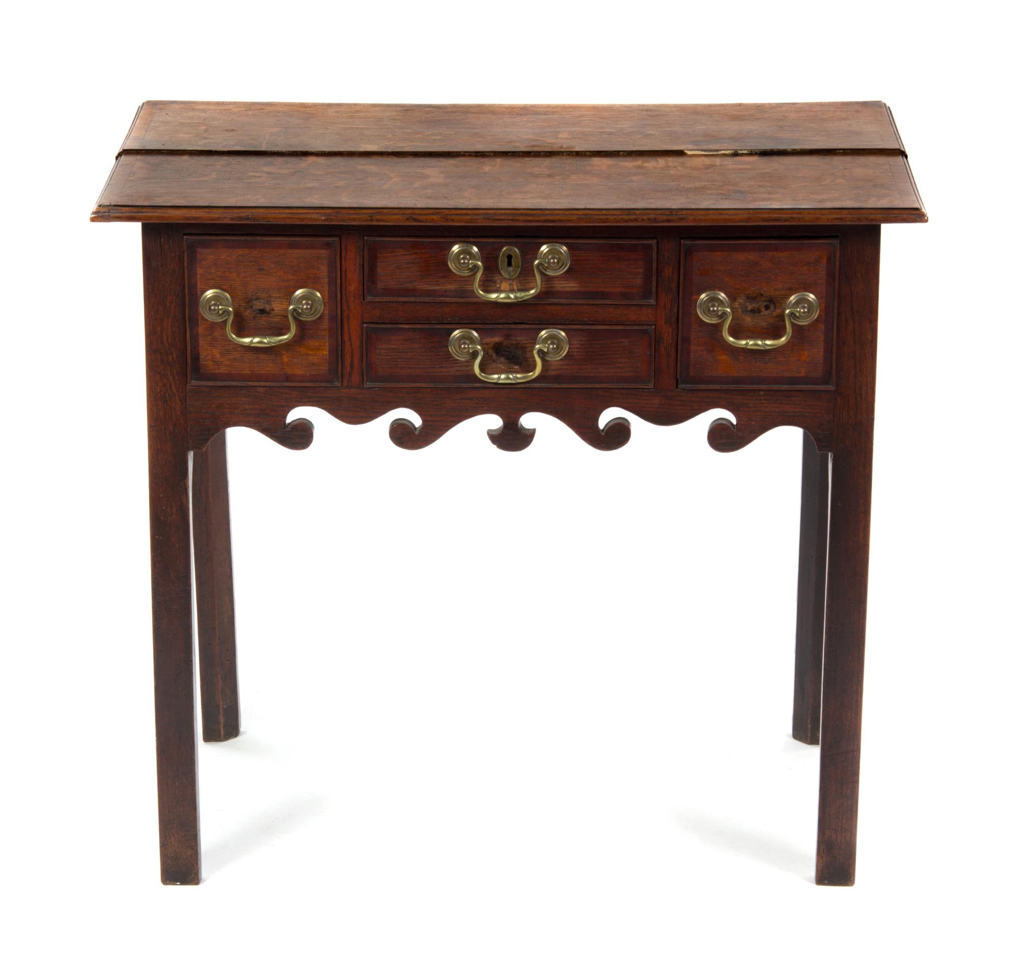 A George II Oak Lowboy, MID-18TH CENTURY, Height 28 1/2 x width 31 3/4 x depth 19 3/4 inches. — MID-18TH CENTURY,