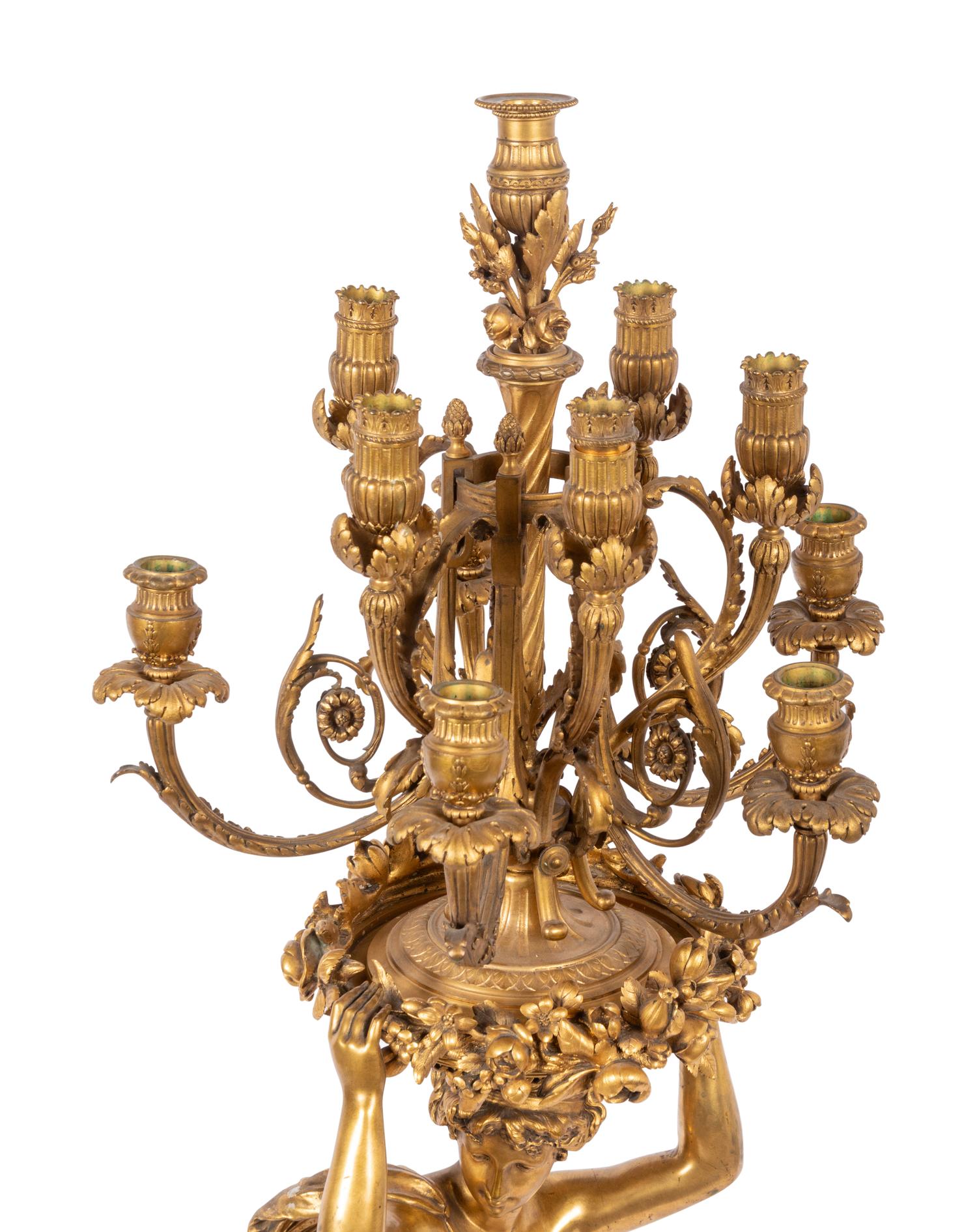 A Large French Gilt Bronze and Marble Figural Candelabrum