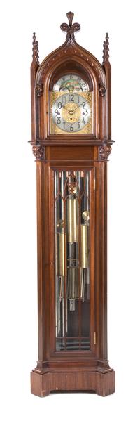 A Gothic Revival Mahogany Tall Case Clock Height 83 x width 18 1/2 x depth 13 inches. — HERSCHEDE, FIRST HALF 20TH CENTURY