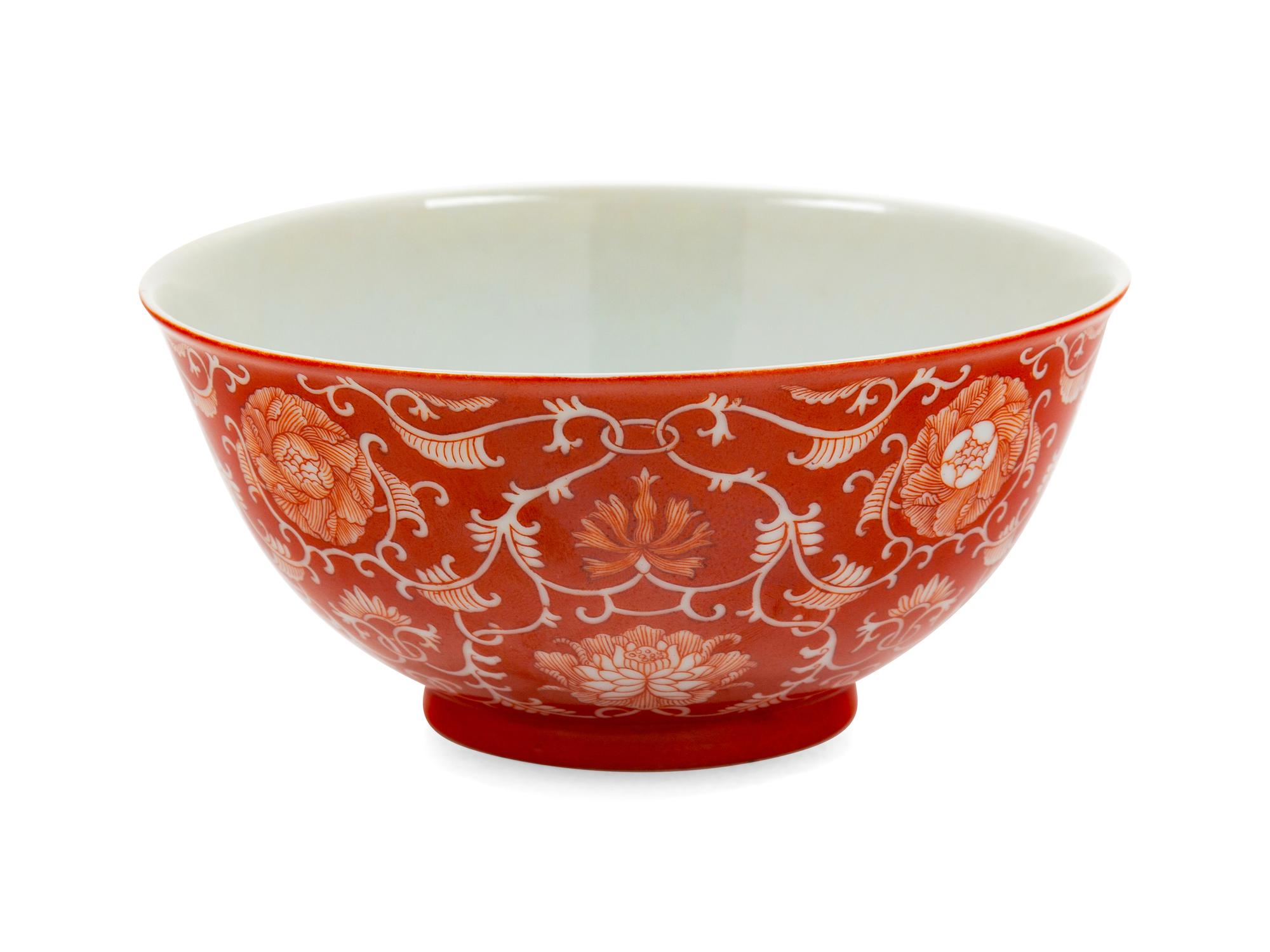 A Reverse-Decorated Coral-Ground Porcelain Bowl