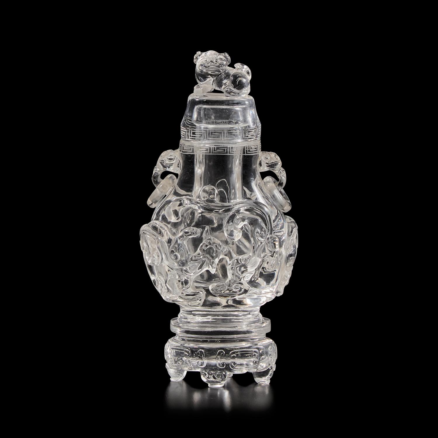 A Chinese Rock Crystal Vase, Cover, and Stand, 19th Century 清晚期 水晶雕螭龍雙耳瓶