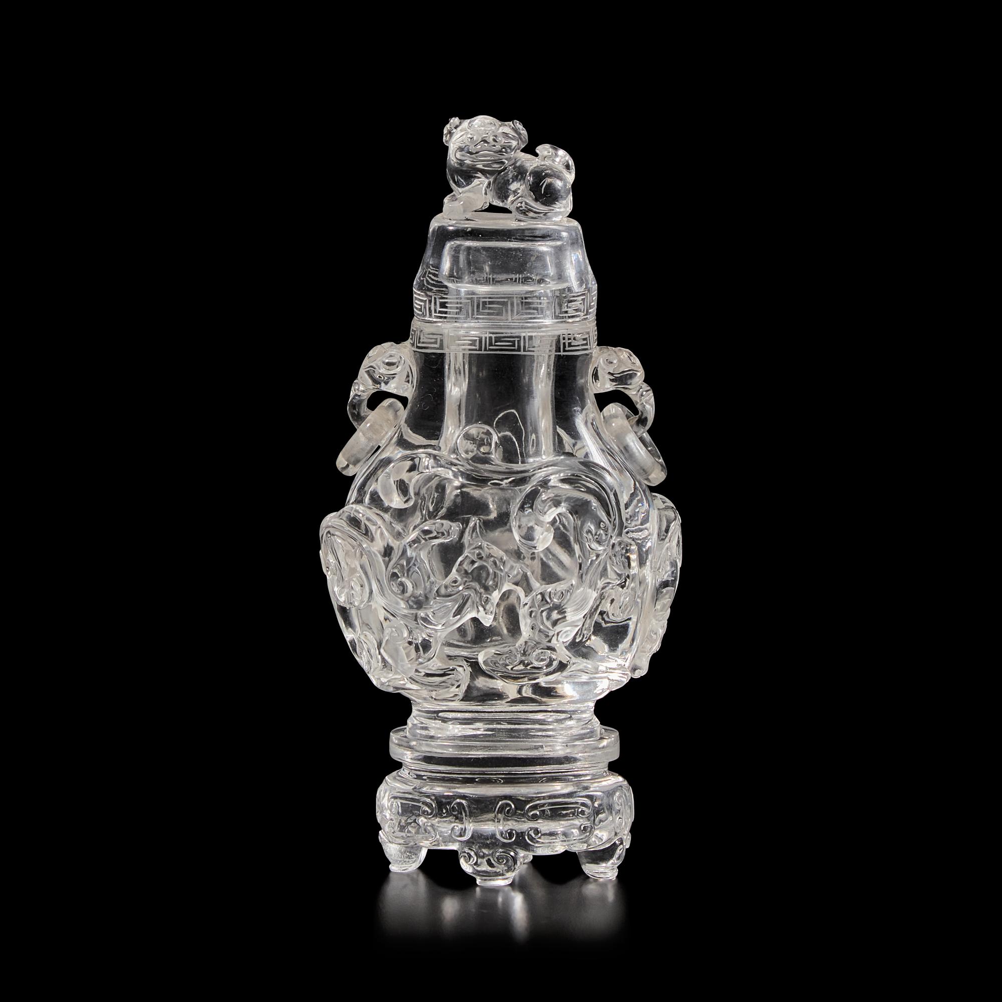 A Chinese Rock Crystal Vase, Cover, and Stand, 19th Century 清晚期 水晶雕螭龍雙耳瓶