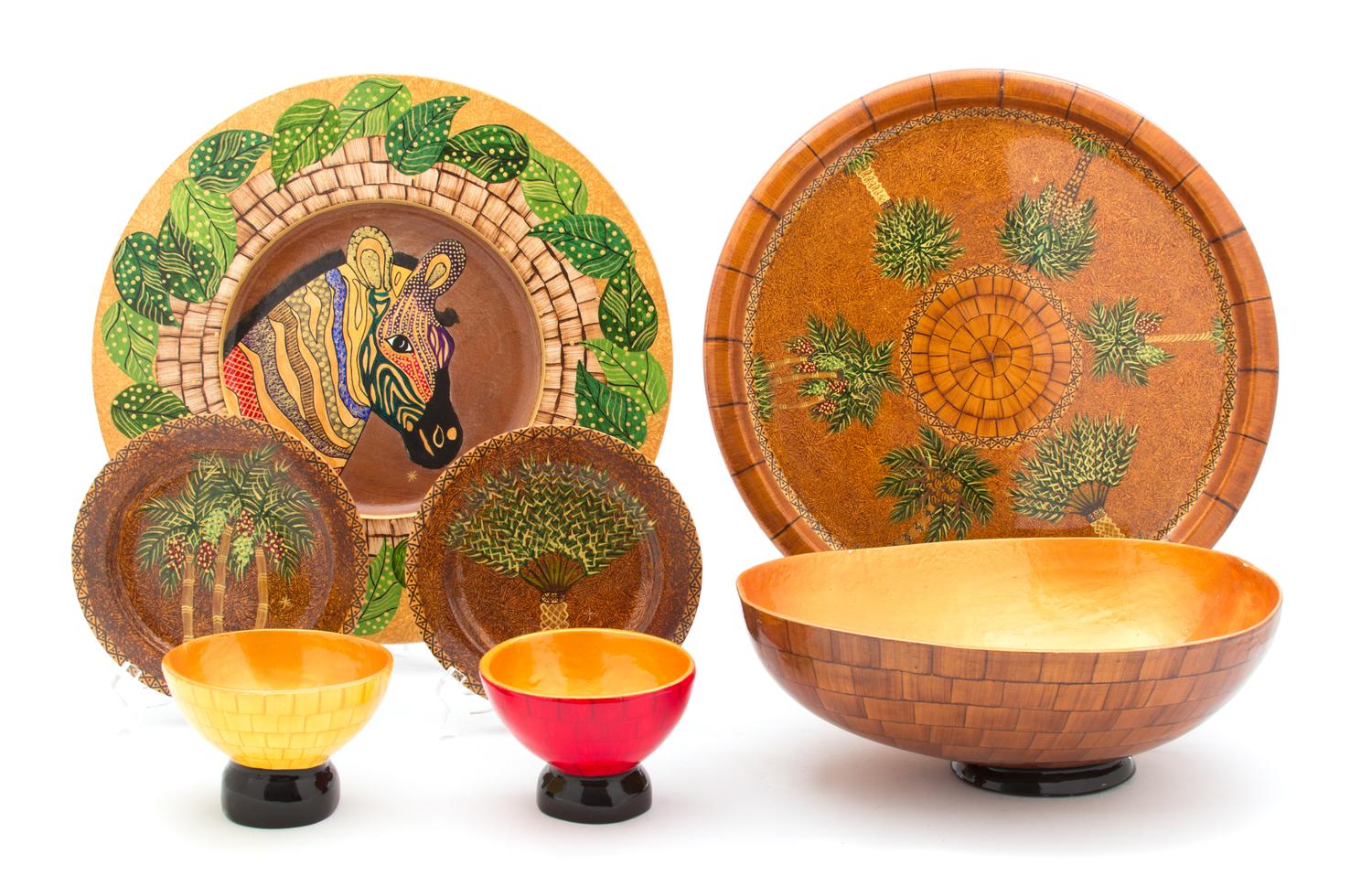 A Set of Hand Painted Mahogany Charger, Plates and Bowls by Bibi Leon, Dominican Republic Diameter of chargers 13 3/4 inches. — 20TH CENTURY