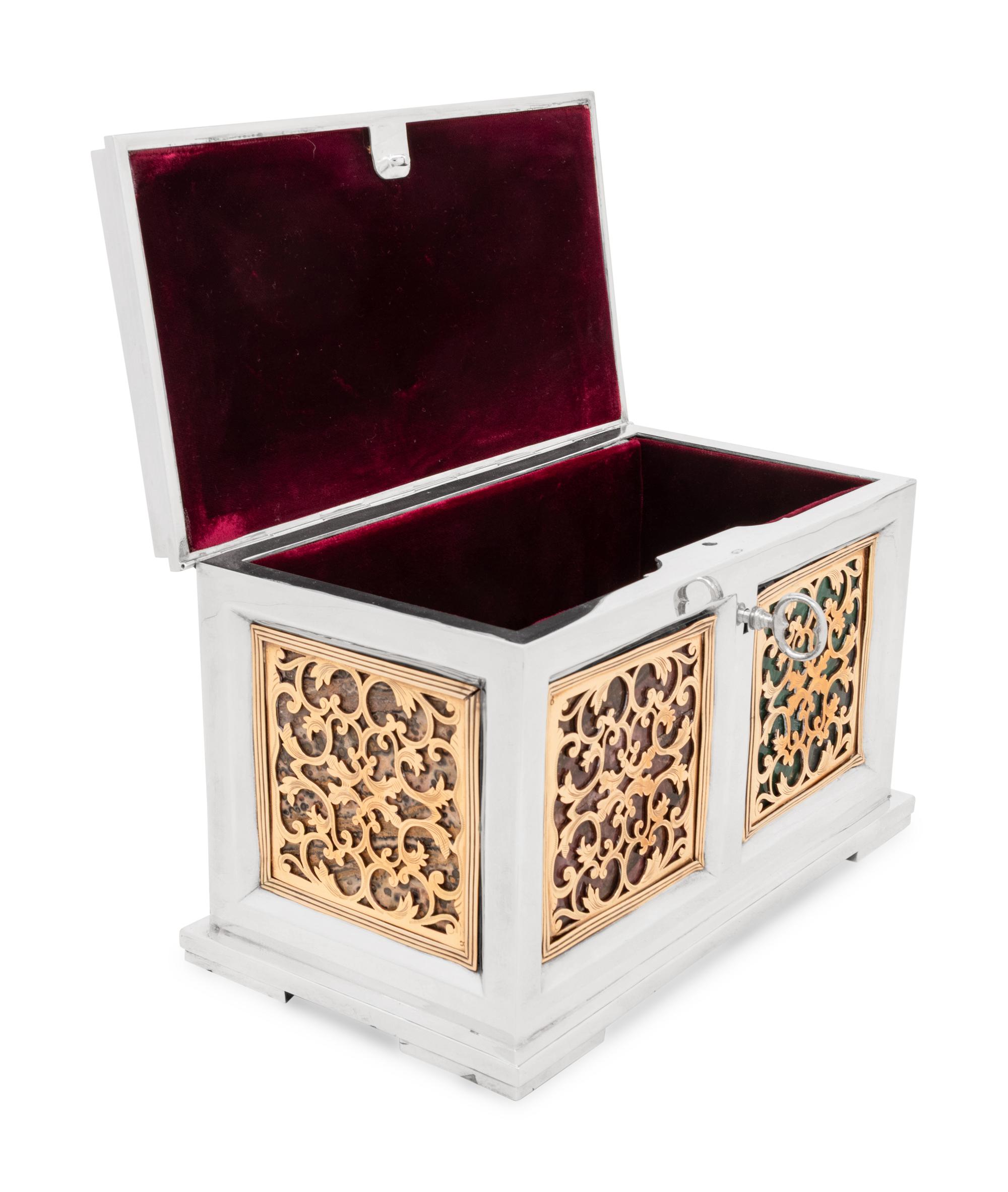 A Continental Baroque Style Silvered and Gilt Metal and Marble Inset Table Casket