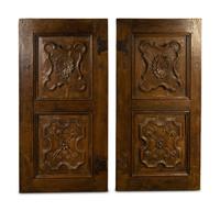 A Pair of Italian Carved Walnut Wall Panels
