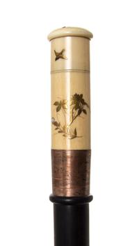 A Japanese Mixed Metal Inlaid Ivory Handled Walking Stick, Length of handle 3 3/4 x length overall 35 3/4 inches.