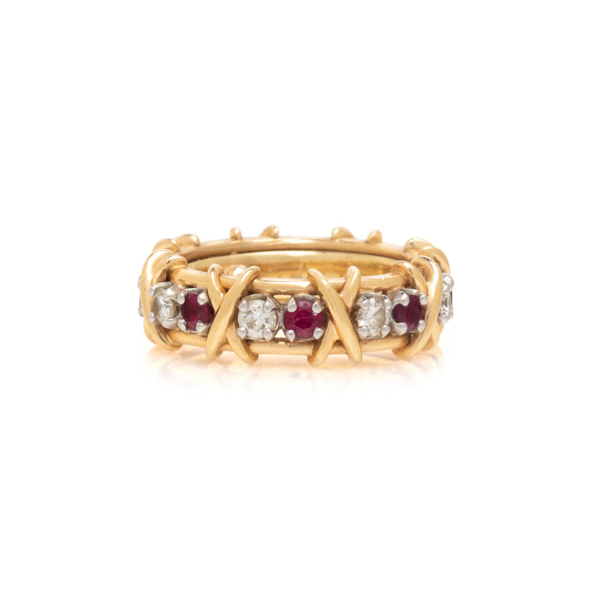 TIFFANY & CO., SCHLUMBERGER, DIAMOND AND RUBY 'SIXTEEN STONE' BAND