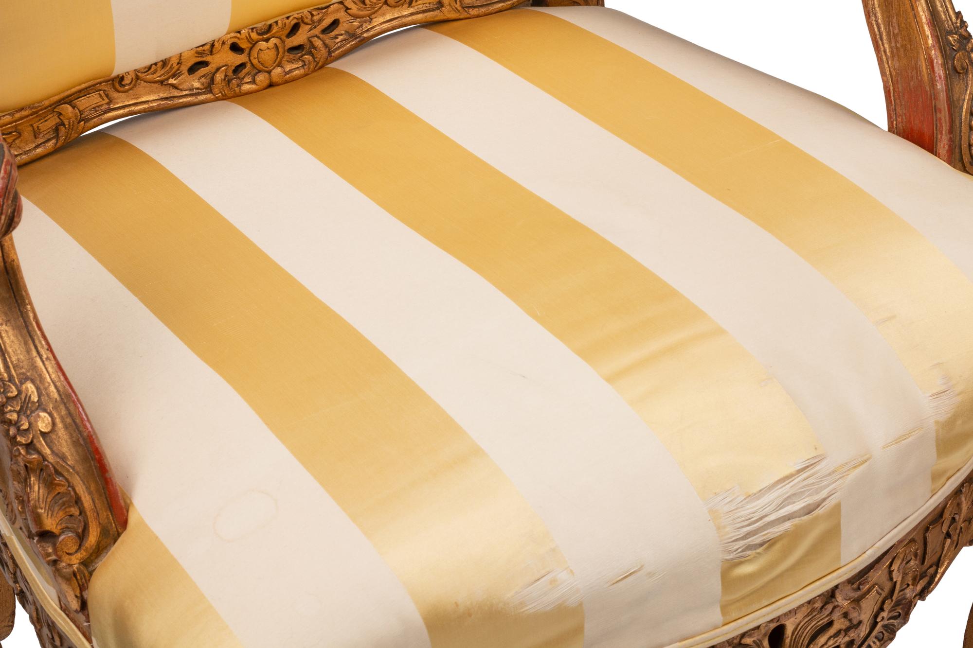 A Pair of Régence Style Giltwood Fauteuils