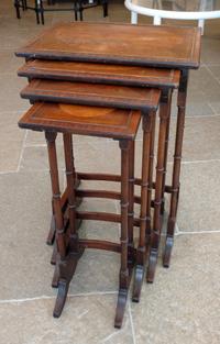 A Nest of Four Mahogany Side Tables