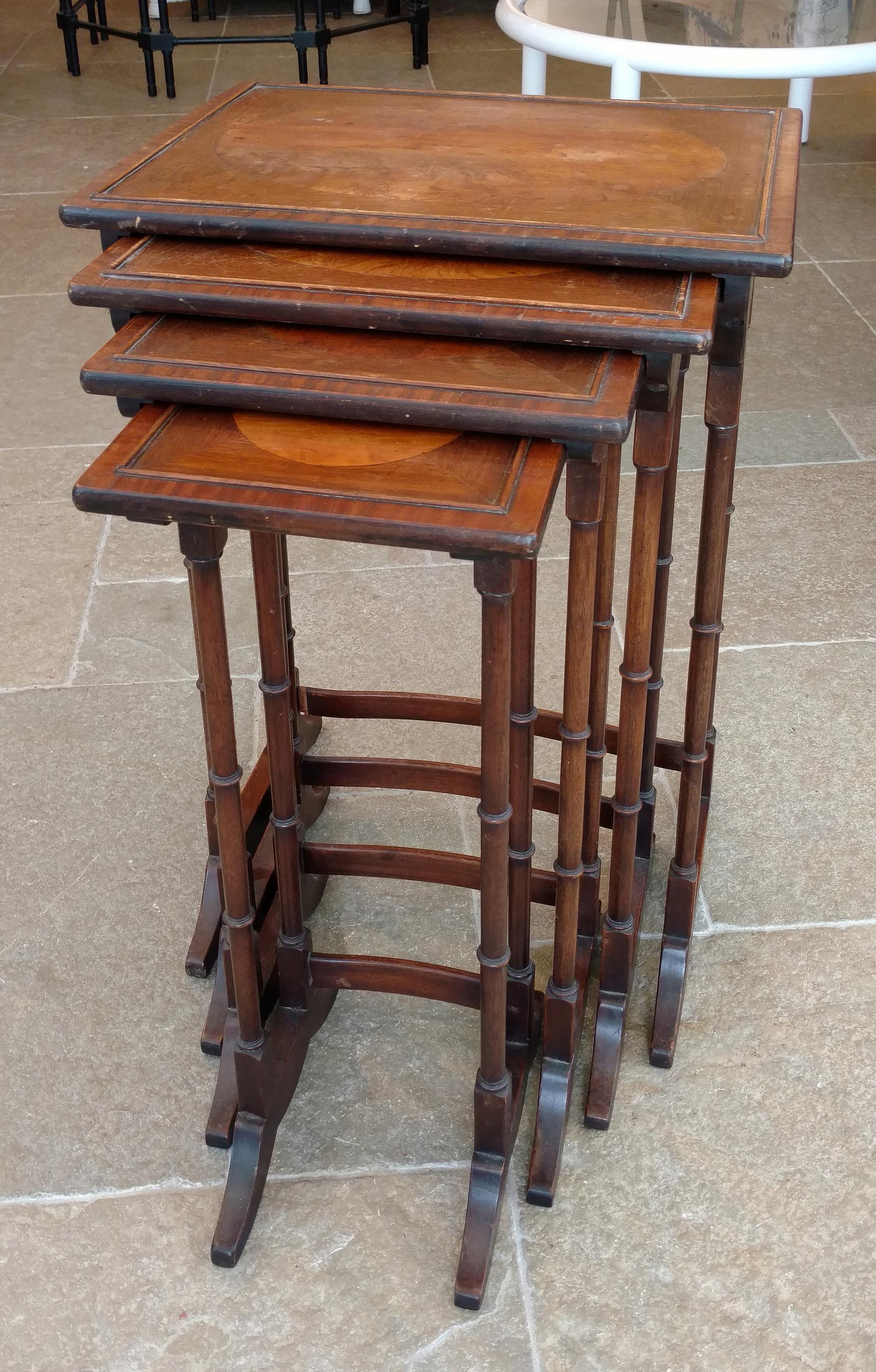 A Nest of Four Mahogany Side Tables