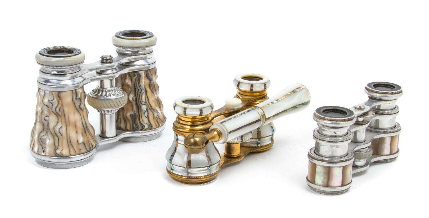 Three Pairs of Continental Mother-of-Pearl Veneered Opera Glasses, Width of first 3 3/4 inches.
