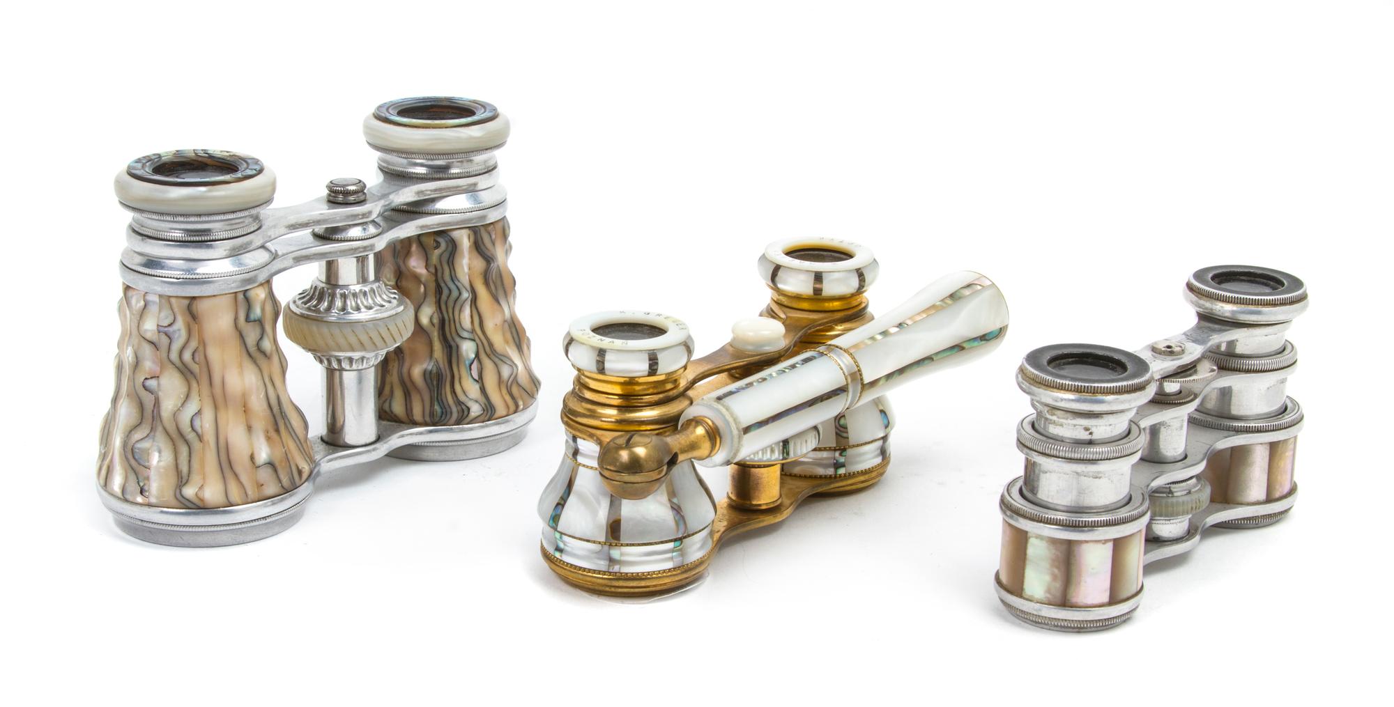 Three Pairs of Continental Mother-of-Pearl Veneered Opera Glasses, Width of first 3 3/4 inches.