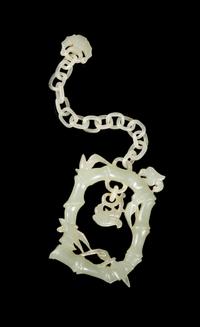 A Pale Celadon Jade 'Bamboo' Hanging Pendant Length overall 6 1/2 inches. — 19TH CENTURY