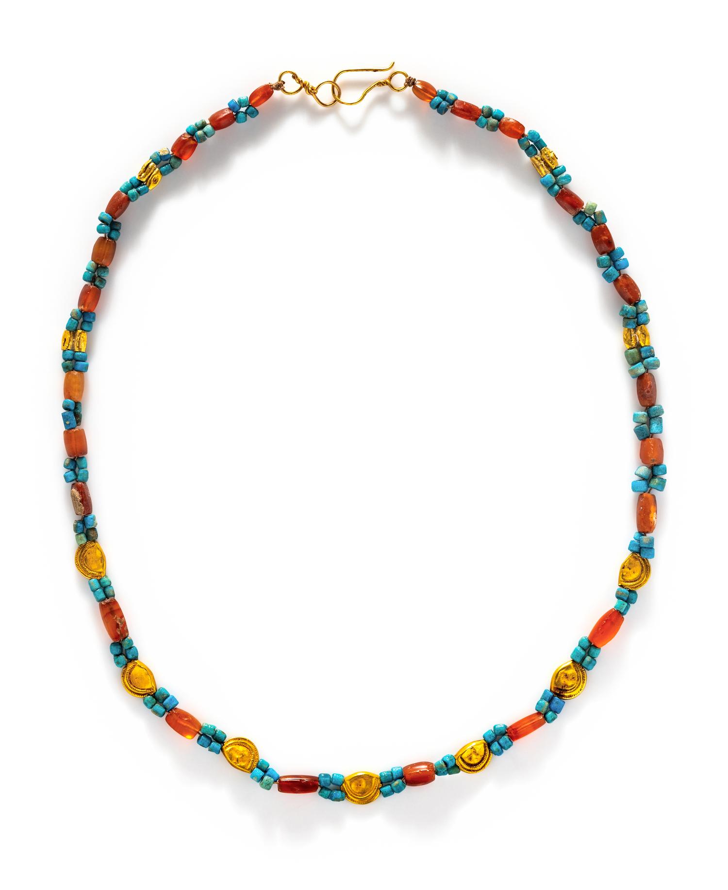 An Egyptian Gold and Carnelian Bead Necklace