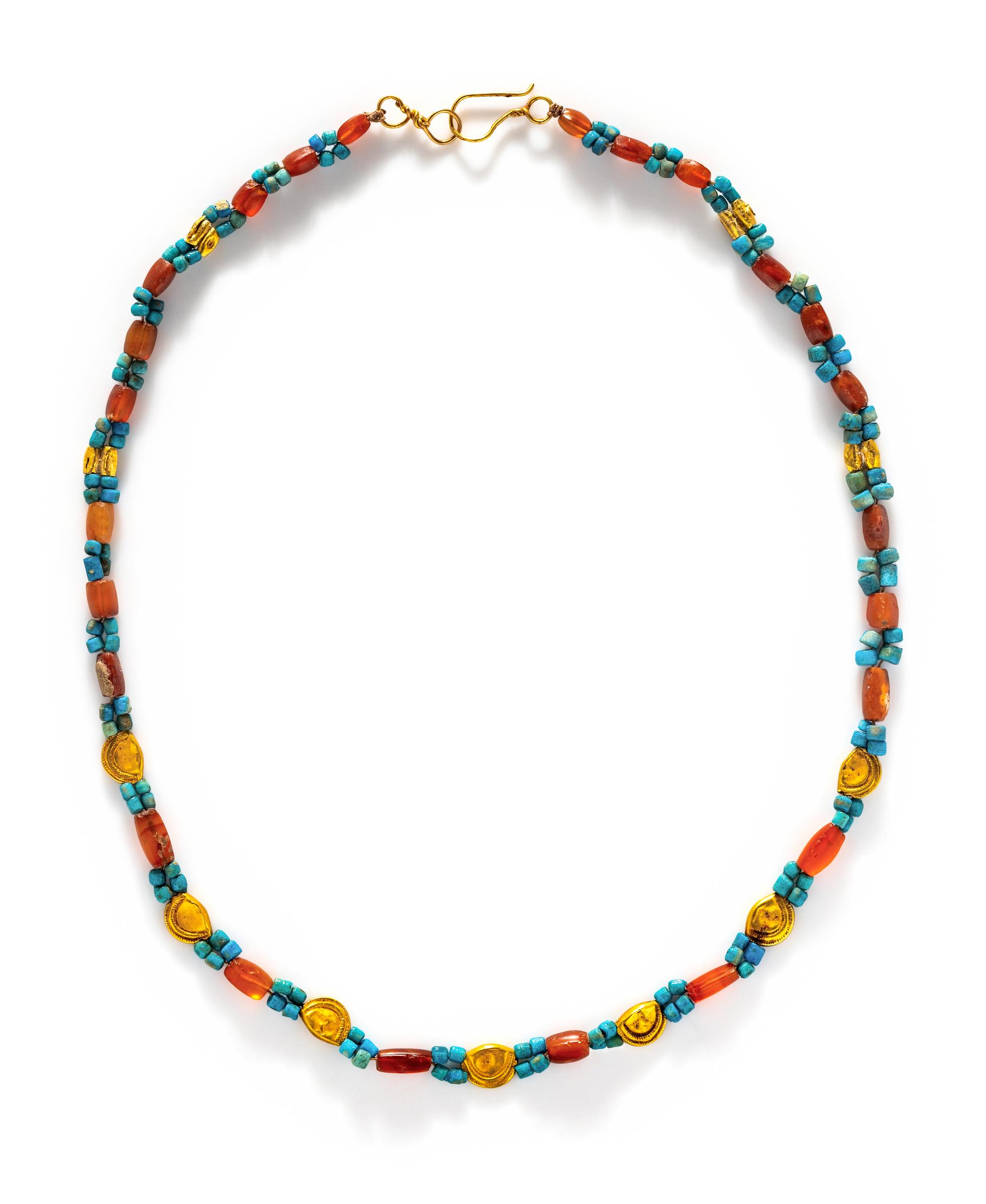 An Egyptian Gold and Carnelian Bead Necklace