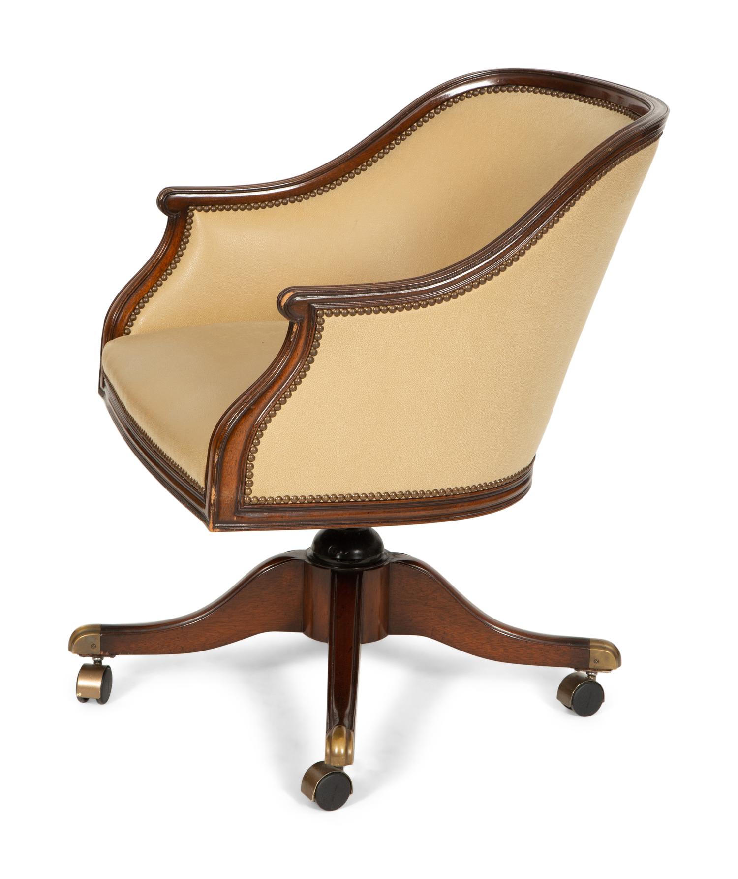 A Regency Style Mahogany Barrell Back Swivel Desk Chair