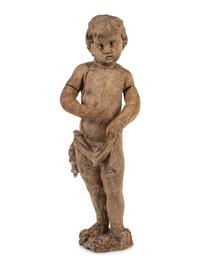 A Continental Carved Wood Putto