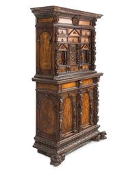 An Italian Renaissance Style Walnut Cabinet