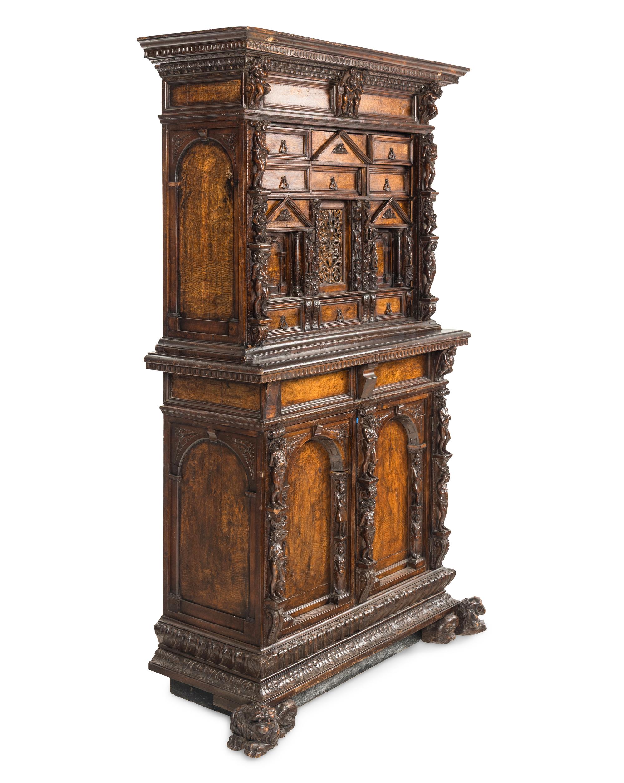 An Italian Renaissance Style Walnut Cabinet